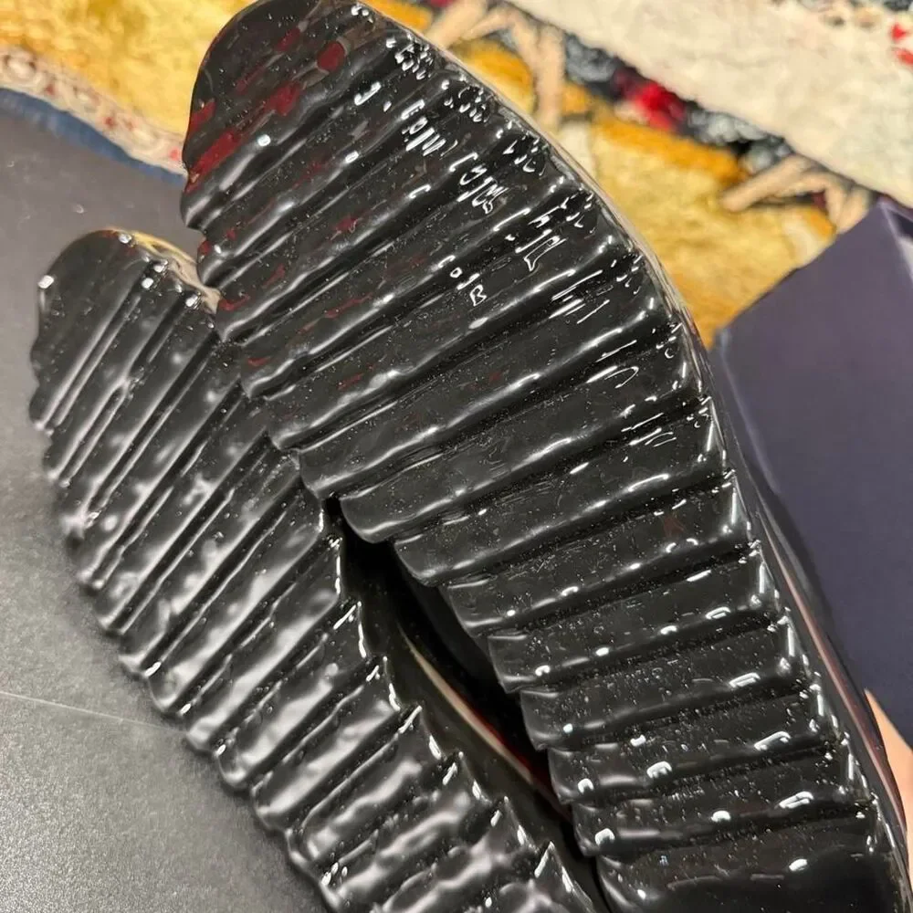 Source Unknown black leather
